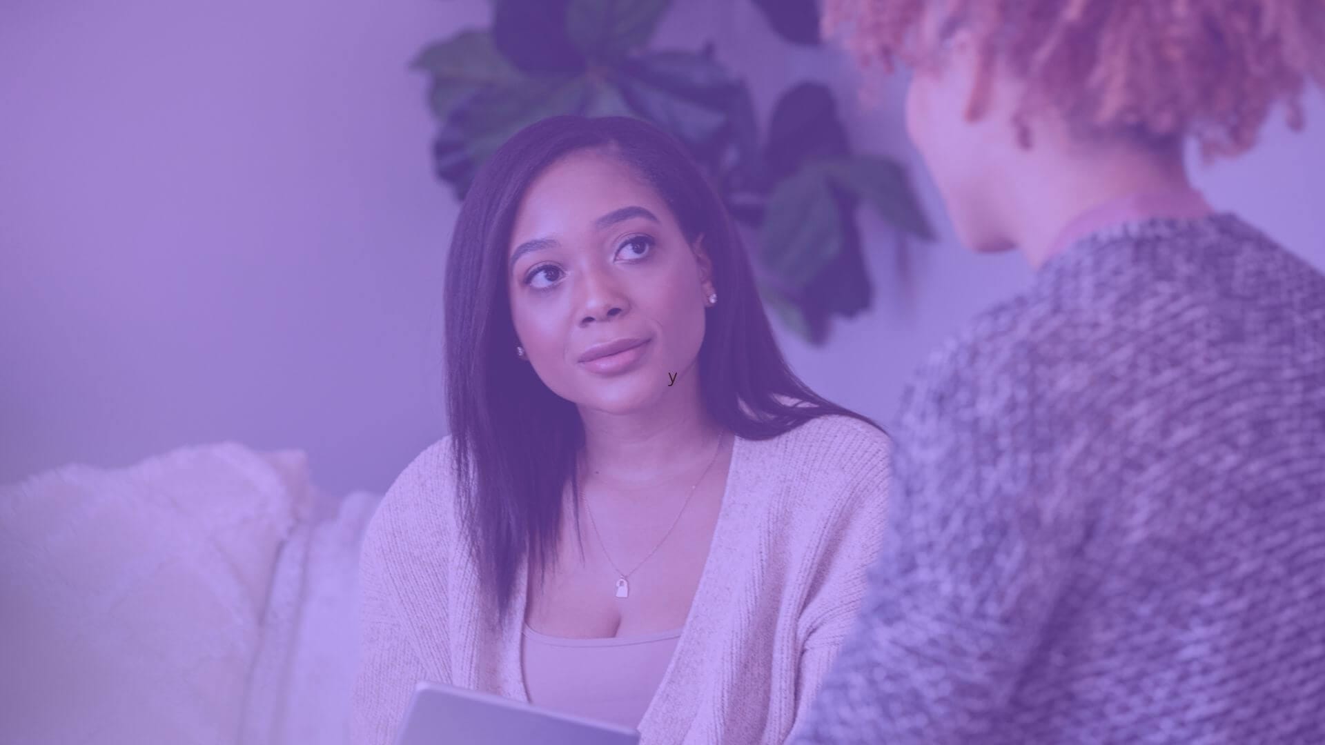 Engaged life coach in a one-on-one session, demonstrating effective conversion strategies, with visual elements depicting growth, success, and personal development